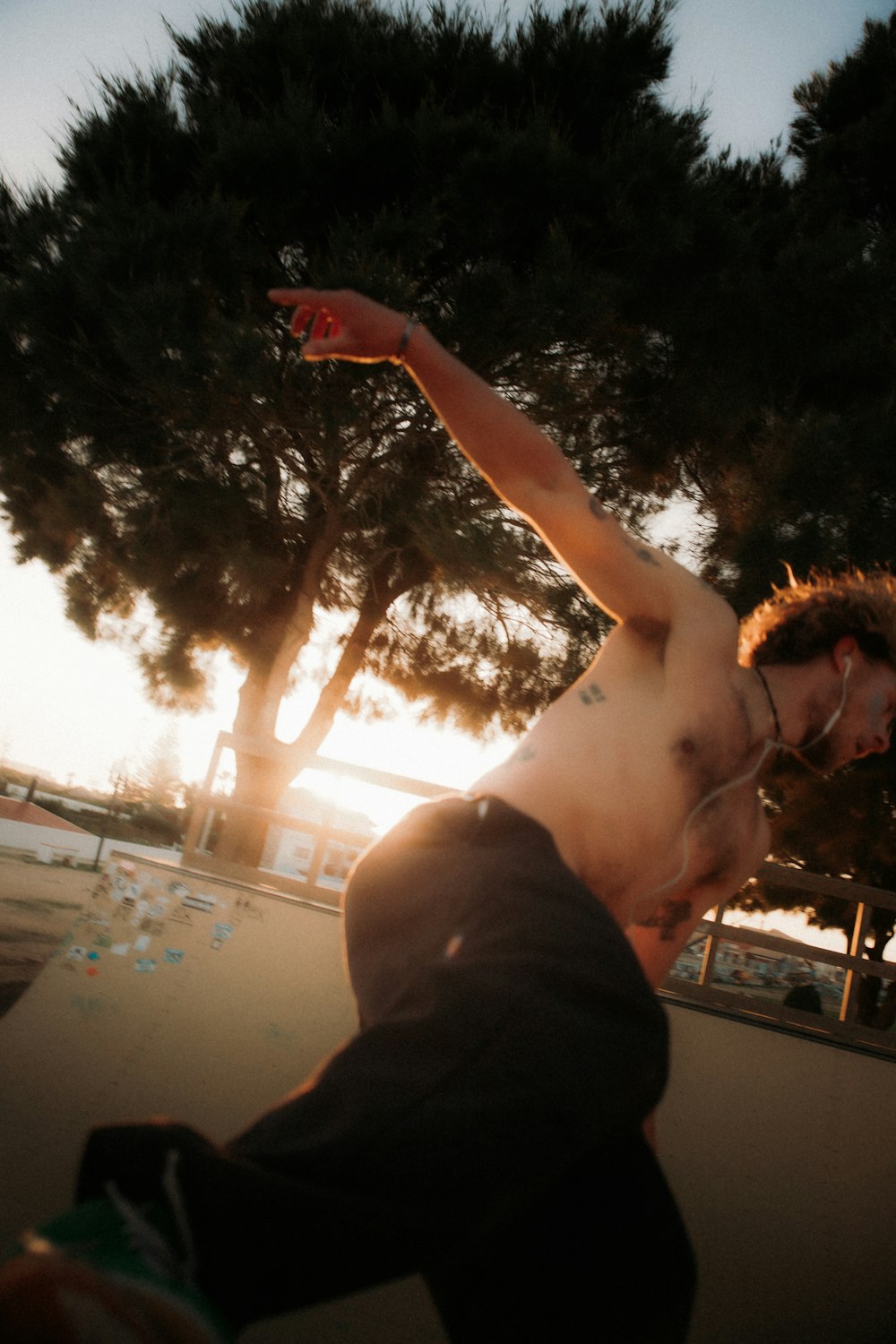 a man riding a skateboard on top of a ramp