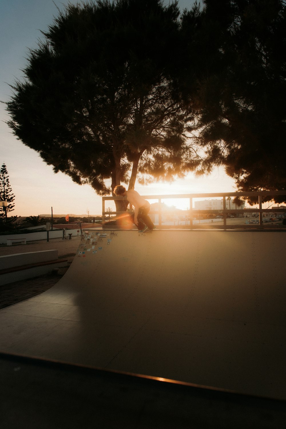 a person riding a skate board on a ramp