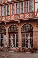 Historic building facade of Restaurante Alqantara in Alcaraz, highlighting its 9th-century architecture.