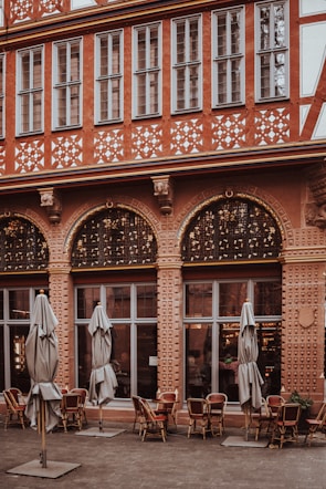 Historic building facade of Restaurante Alqantara in Alcaraz, highlighting its 9th-century architecture.