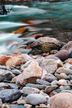 A flowing river representing steady progress and adaptability.