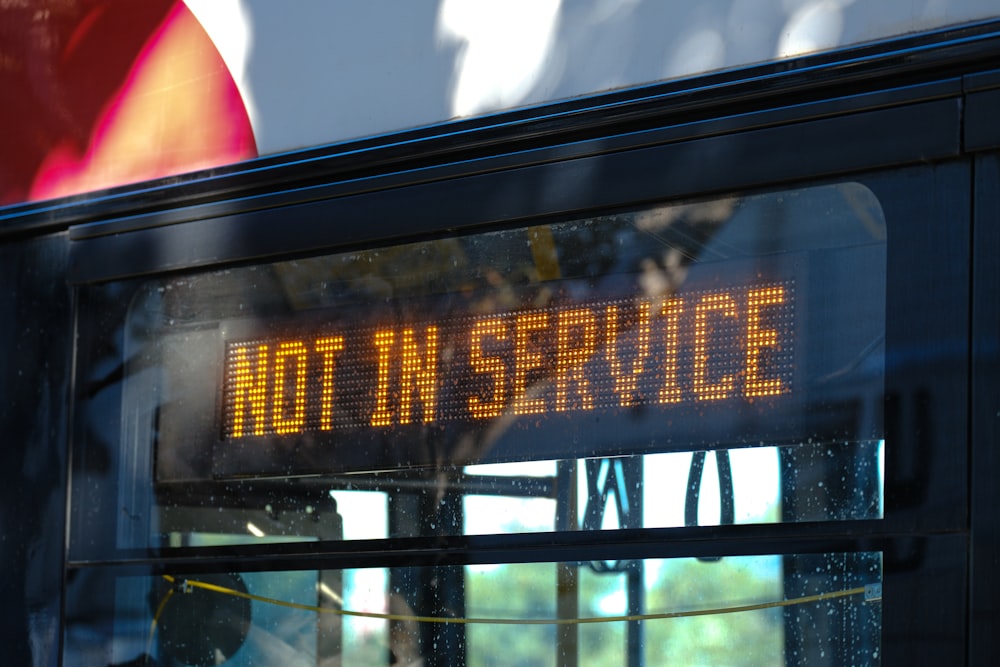 a close up of a sign on a bus