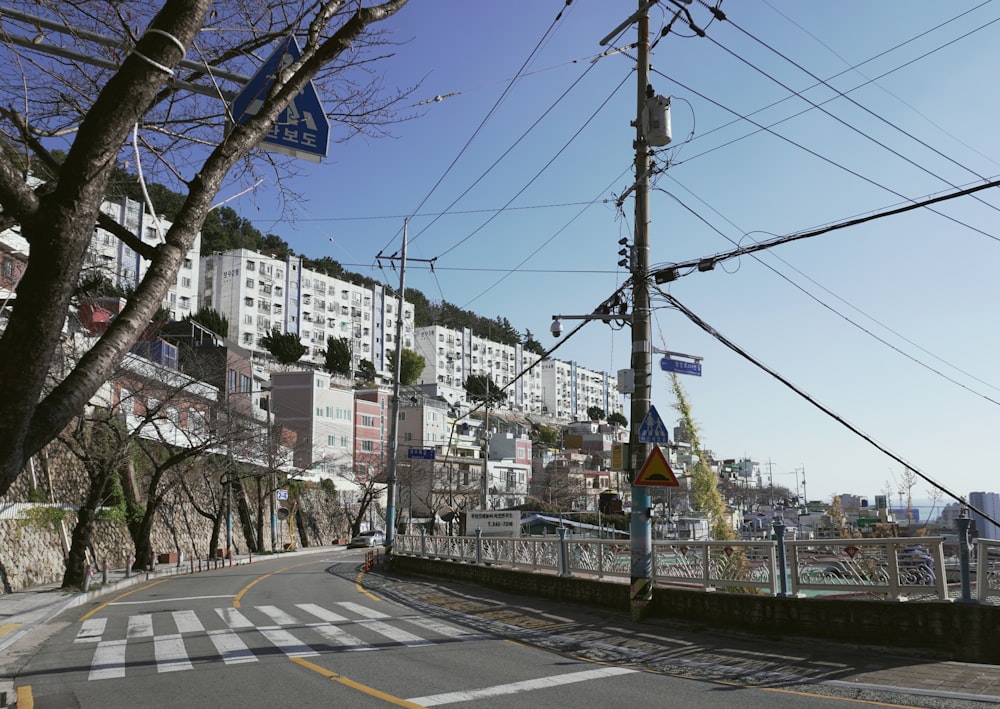 a street with a hill in the background