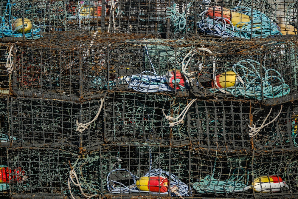 a pile of lobster traps stacked on top of each other
