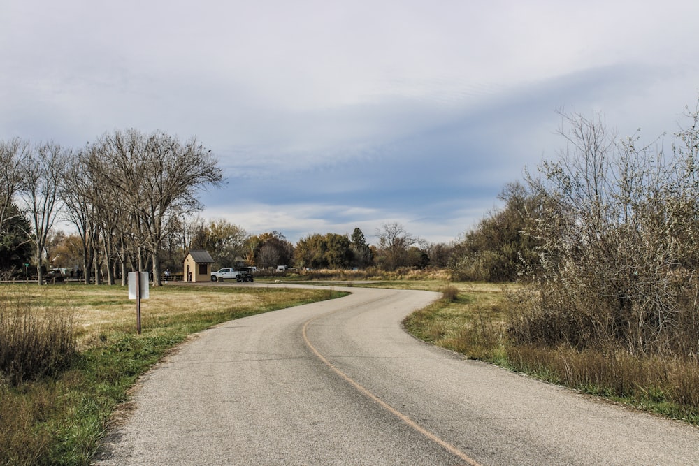 a road with a sign on the side of it