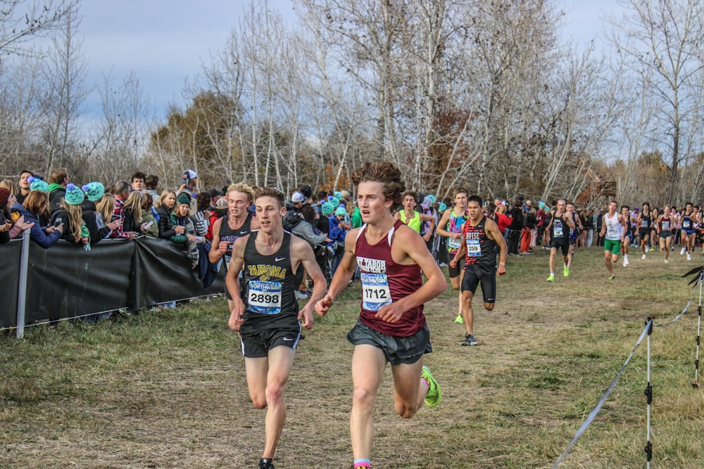 a group of people running in a race