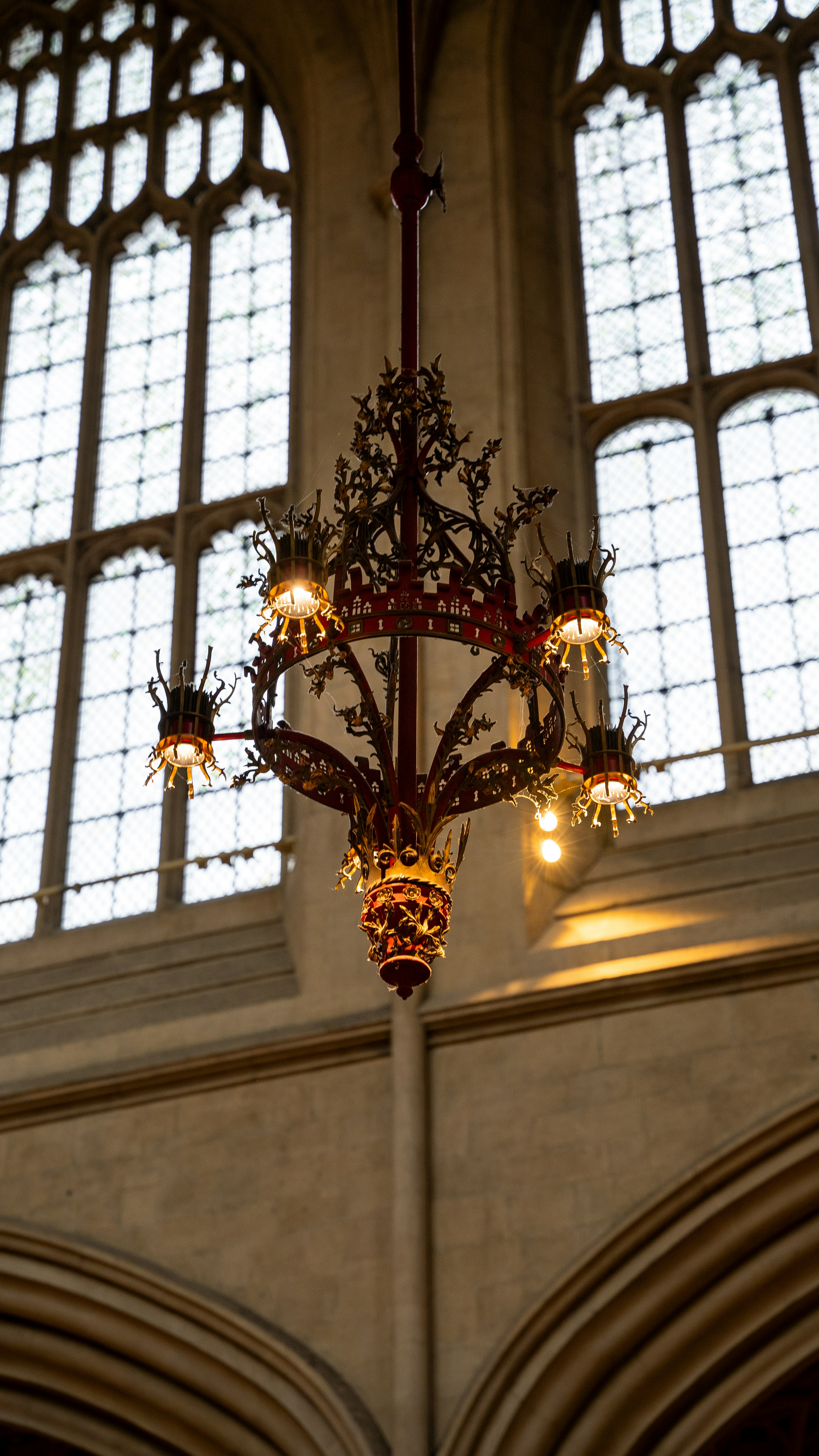 a chandelier hanging from the ceiling of a building