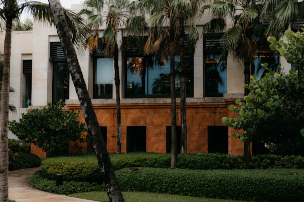 Exterior shot of a commercial building with a stylish facade and landscaped surroundings
