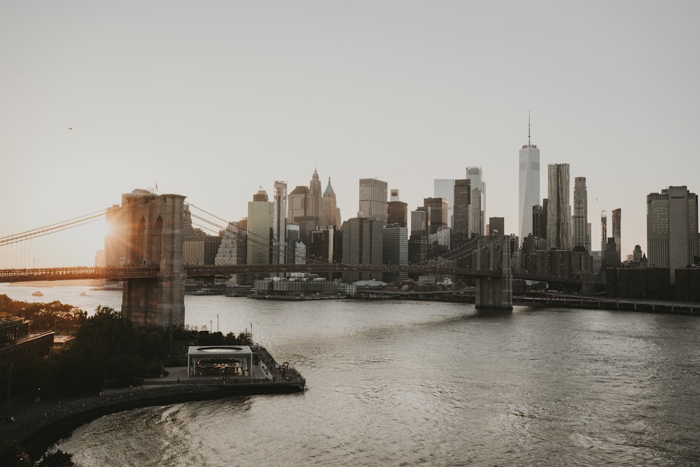 a large body of water with a city in the background