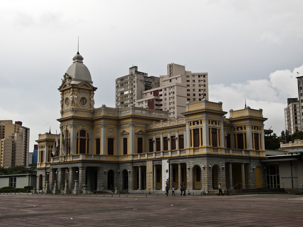 a large building with a clock on the top of it