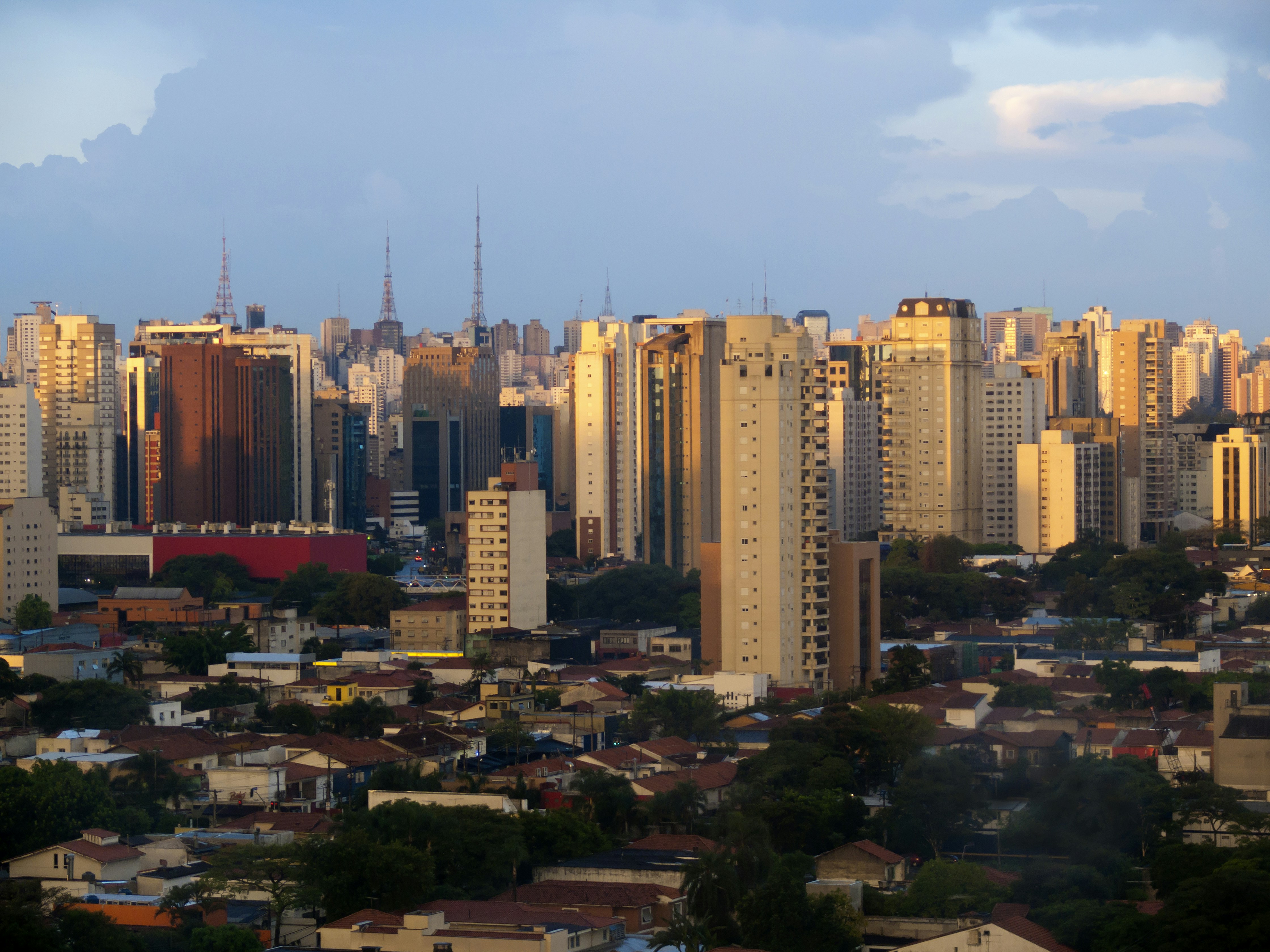 a view of a city with tall buildings