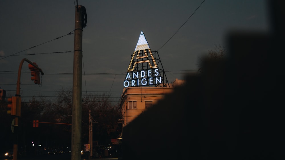 a very tall building with a large sign on it's side