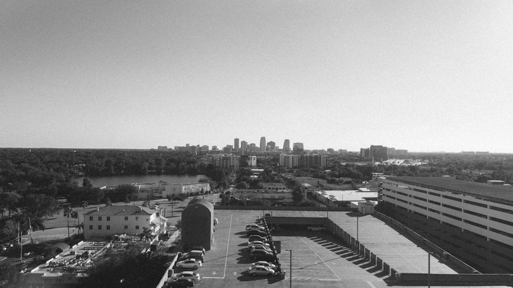a black and white photo of a parking lot
