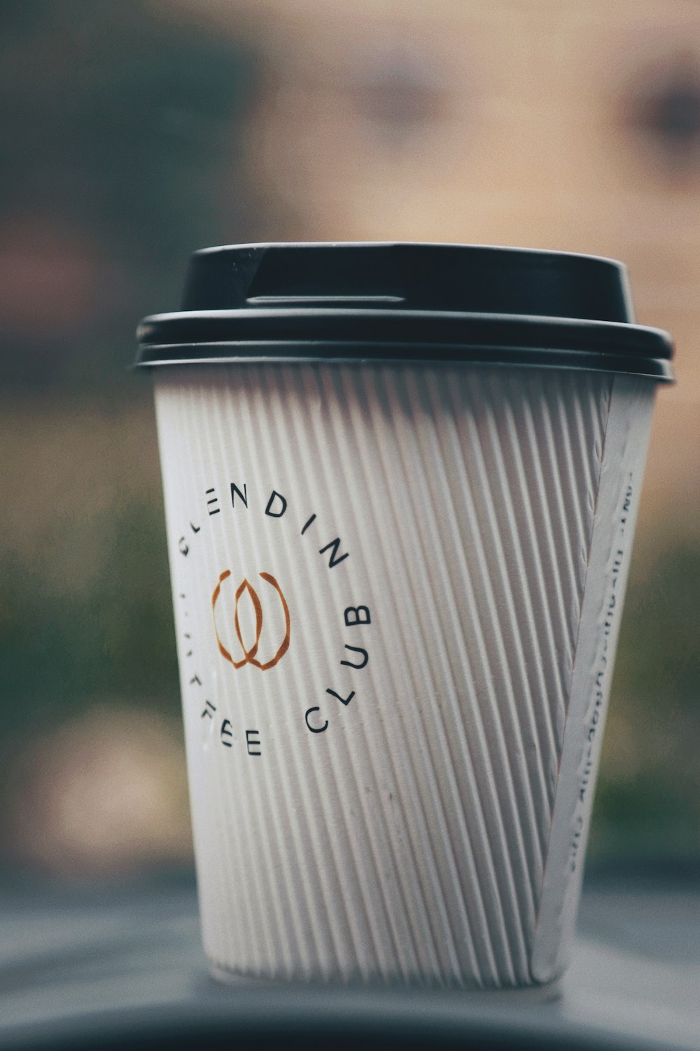 a coffee cup sitting on top of a table