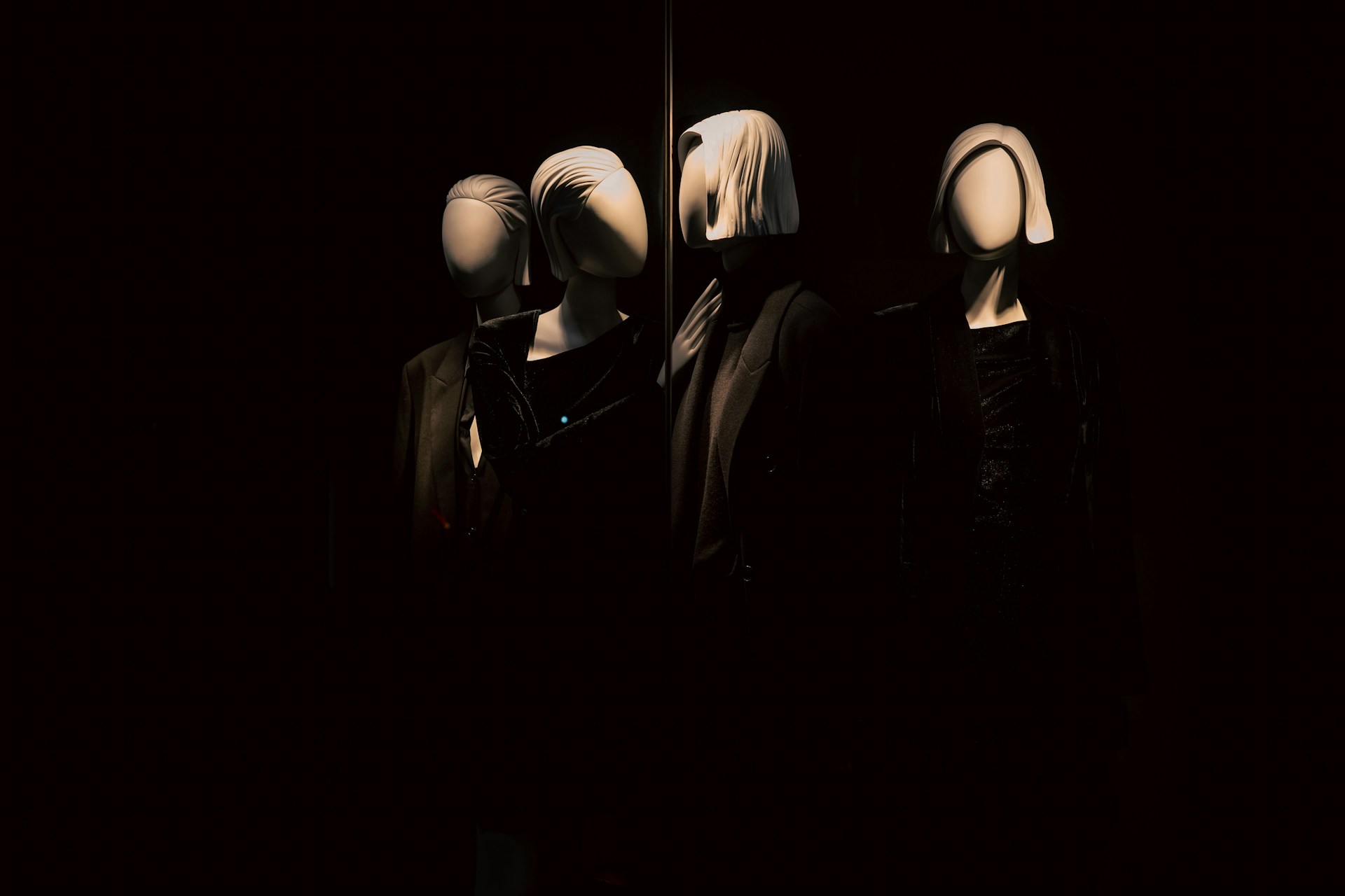 A mystical voodoo-inspired outfit showcased on a softly lit mannequin with subtle fading effects.