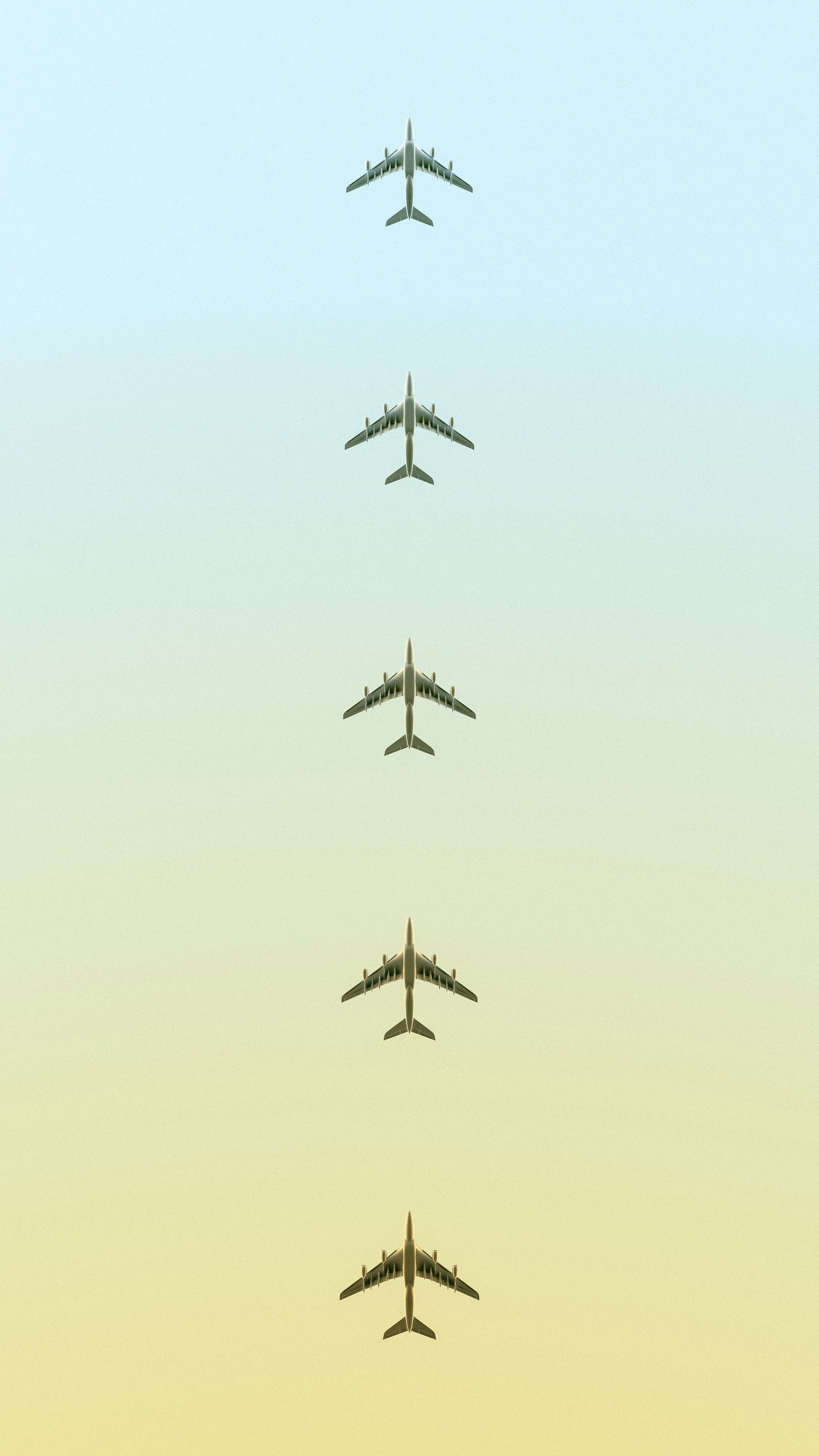 woman wearing yellow long-sleeved dress under white clouds and blue sky during daytime