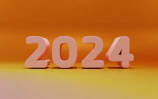 A playful countdown timer displayed on a pastel background with pixel art accents.