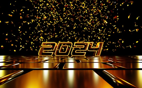 a shiny metal table with confetti in the background