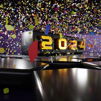 A metallic platform displays the year 2024 in bold, illuminated numbers. Colorful confetti floats through the air, creating a festive and celebratory atmosphere. The background features a mix of dark and purple hues, enhancing the vibrant contrast of the confetti.