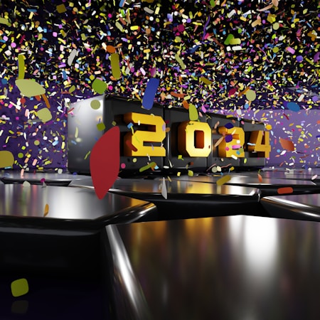 A metallic platform displays the year 2024 in bold, illuminated numbers. Colorful confetti floats through the air, creating a festive and celebratory atmosphere. The background features a mix of dark and purple hues, enhancing the vibrant contrast of the confetti.