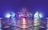 Large 3D numbers '2024' stand on a reflective tiled surface, illuminated by colorful lighting that casts a gradient across the scene. The background features a smooth gradient transitioning from blue to purple, complementing the shiny metallic look of the numbers.