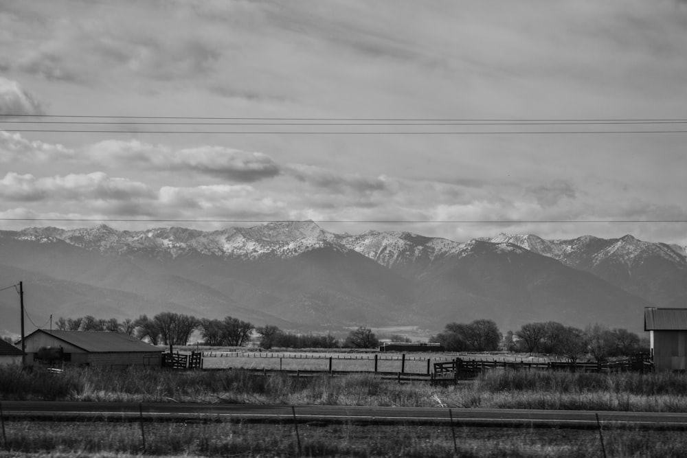 a black and white photo of a mountain range