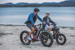 A scenic bike path with riders enjoying electric bikes