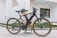 A happy customer holding a Velomintor gadget.