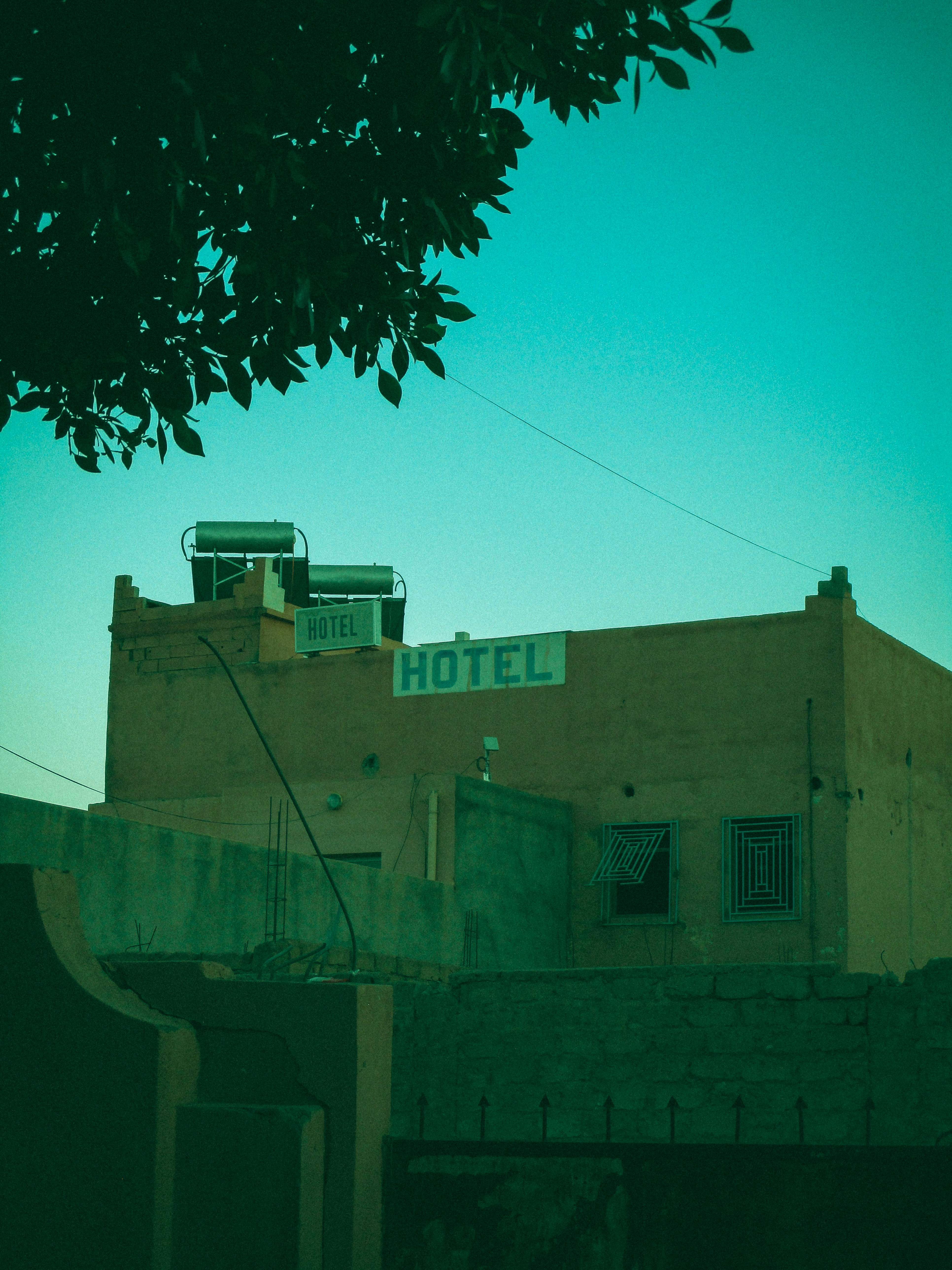 a building with a hotel sign on top of it