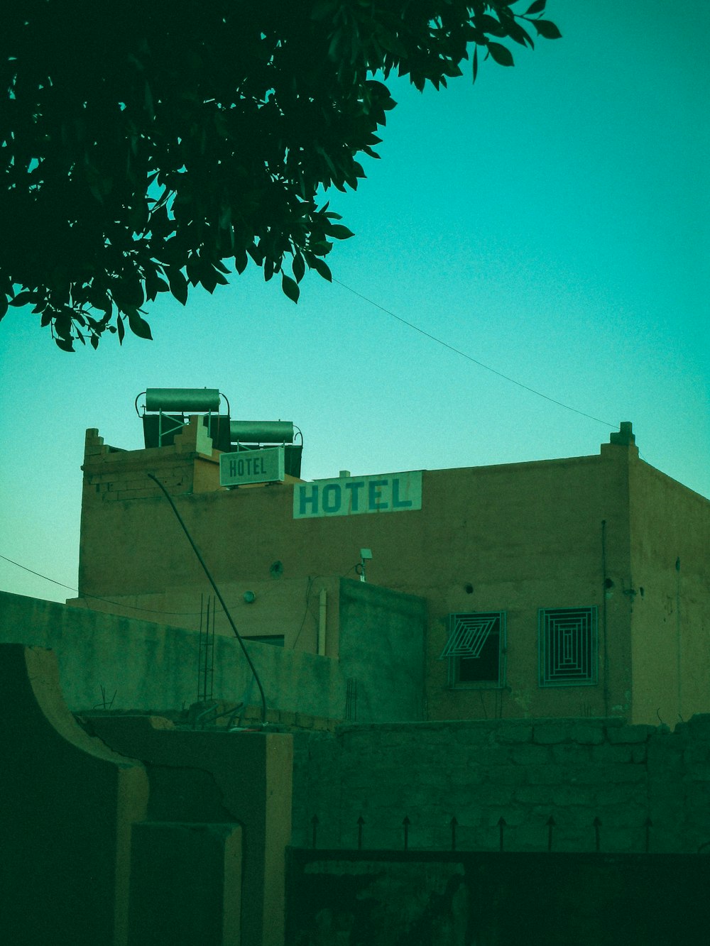 a building with a hotel sign on top of it