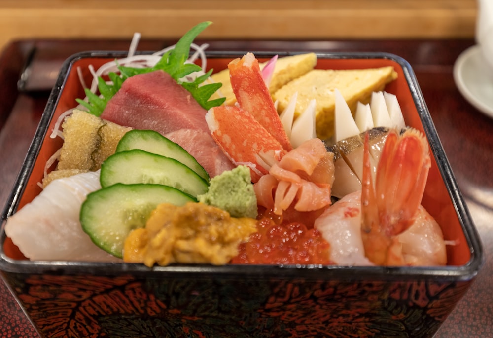 a close up of a tray of food on a table