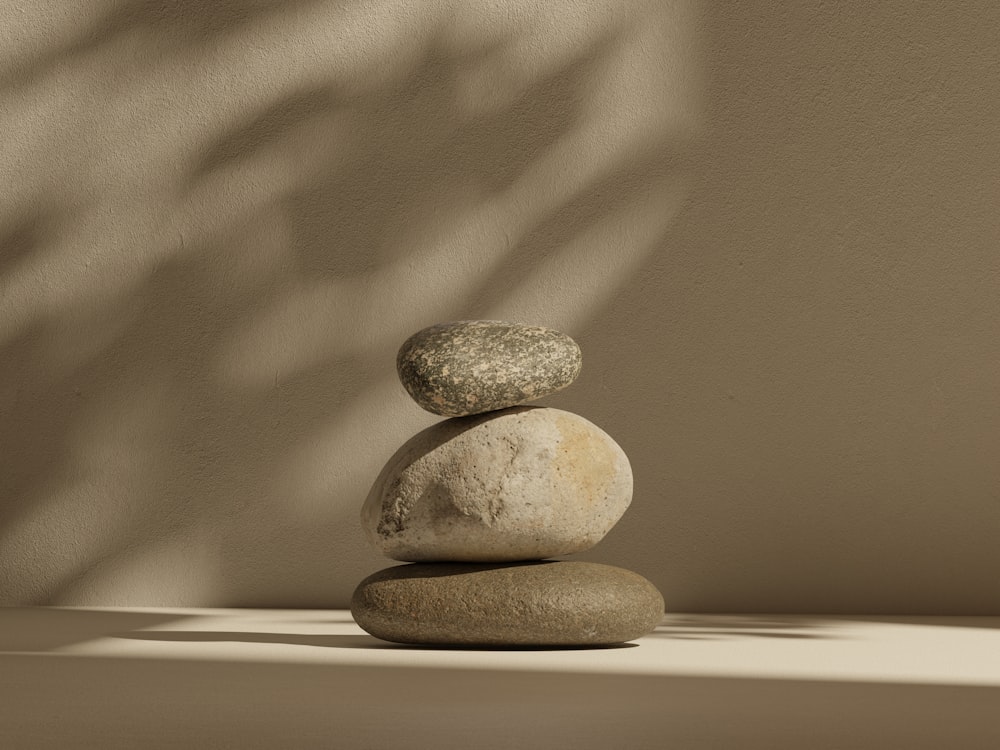 a stack of rocks sitting on top of a table