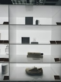 A minimalist display of accessories on a clean surface.