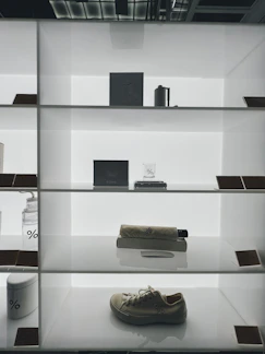 A sleek black and white minimalist display of stylish home accessories.