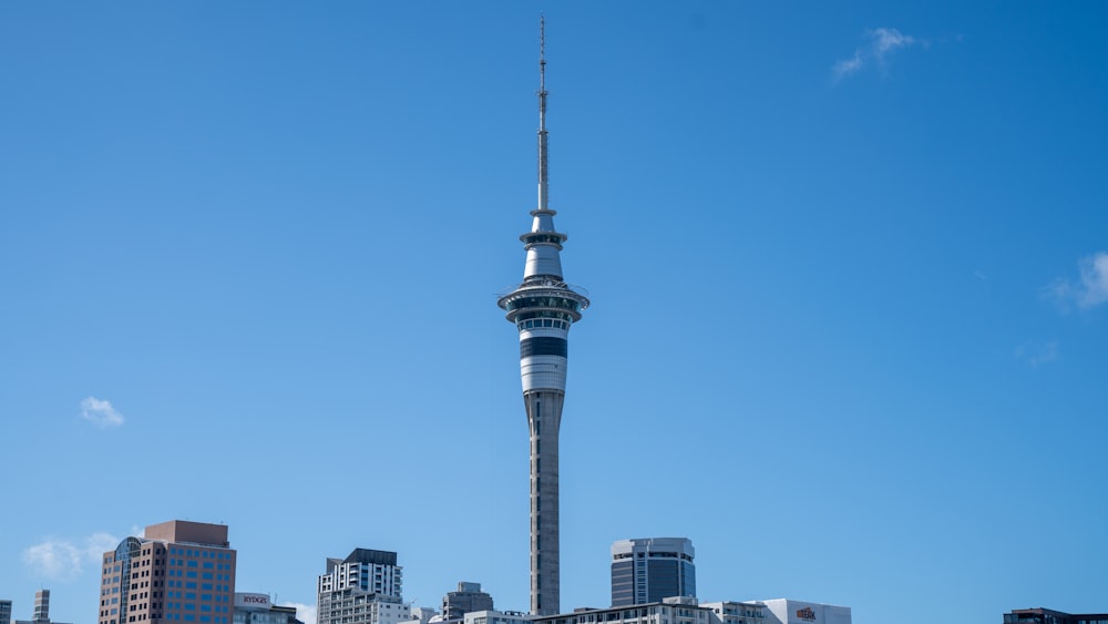 a very tall tower towering over a city