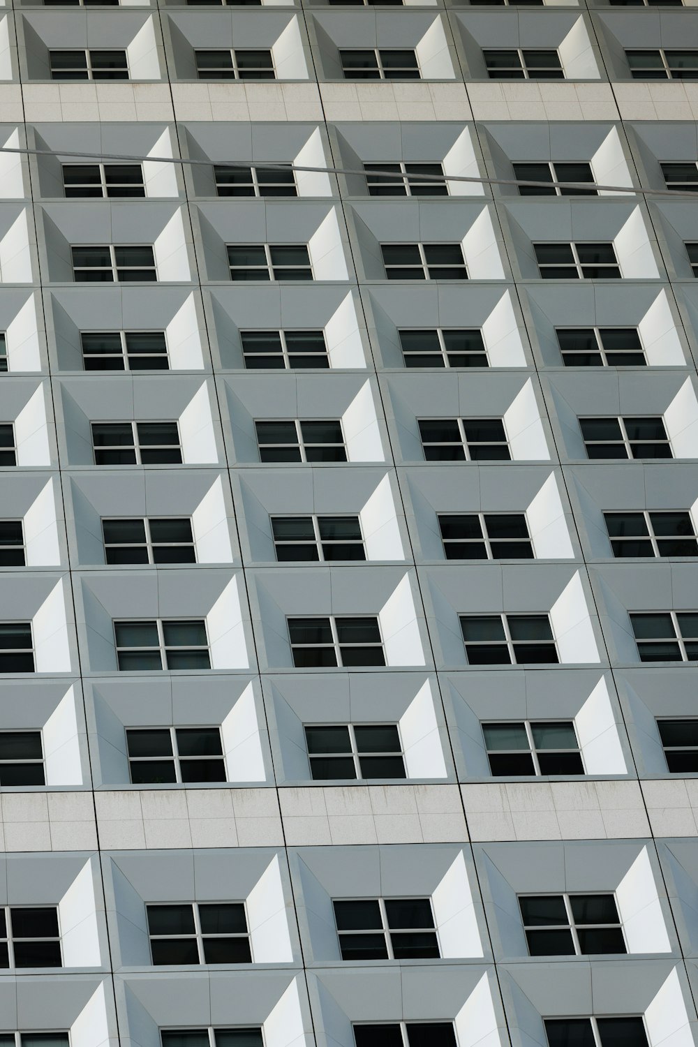 a very tall building with lots of windows