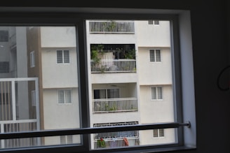 Wide shot of a residential building featuring multiple UPVC windows from ekasila bellezza.