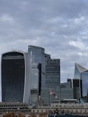 A panoramic view of a bustling city skyline representing the UK locations we serve.