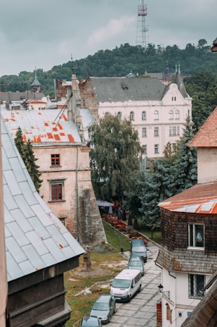 A scenic view of a small town with satellite dishes on rooftops, symbolizing connectivity.