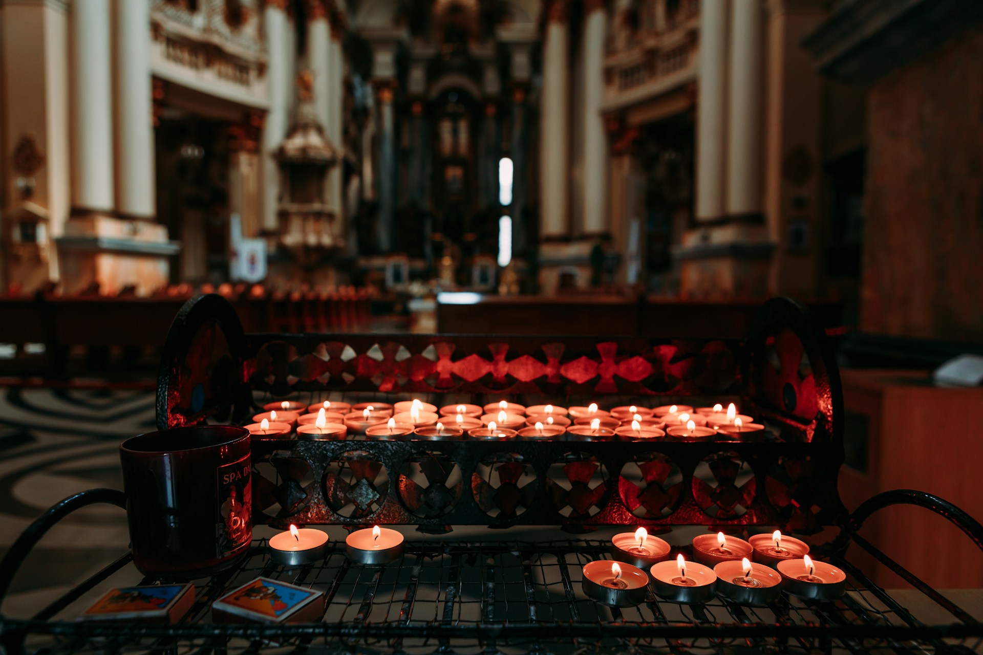 a bunch of candles that are on a table