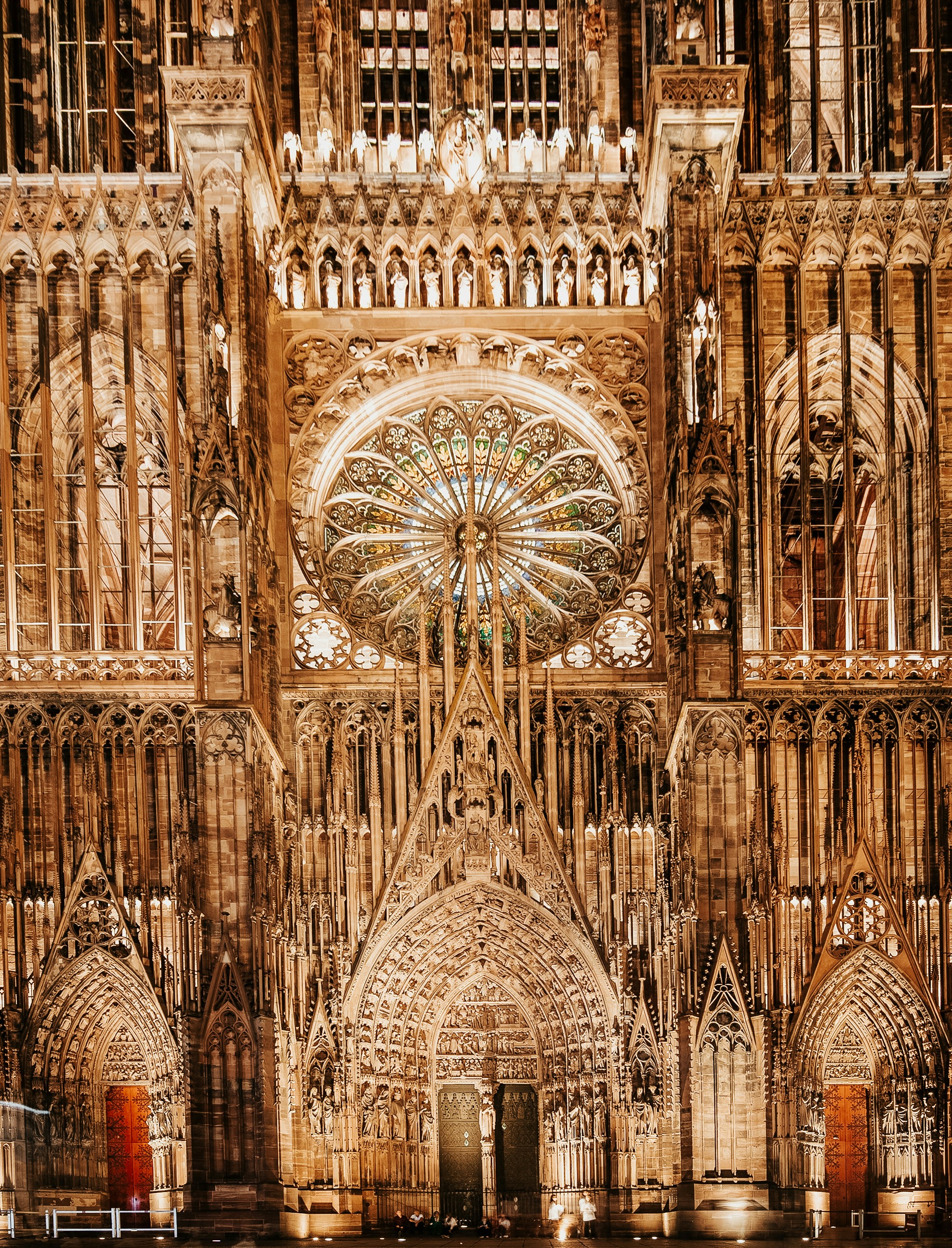 A large cathedral with a stained glass window photo – Free Arch Image ...