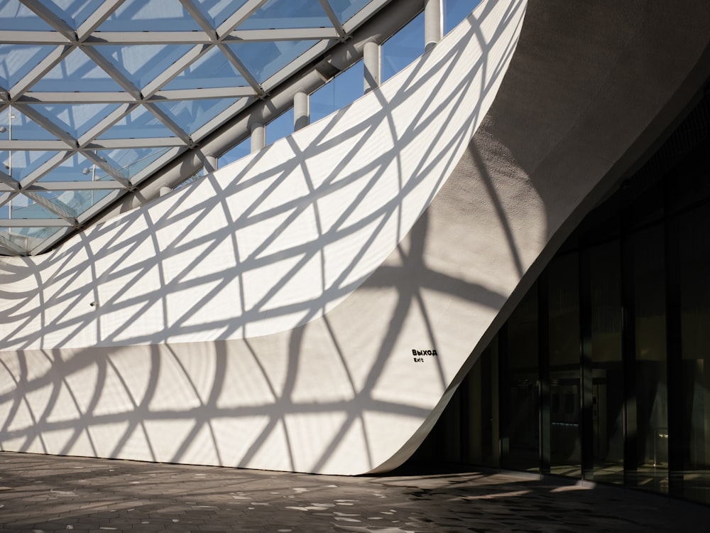 a large white building with a glass roof