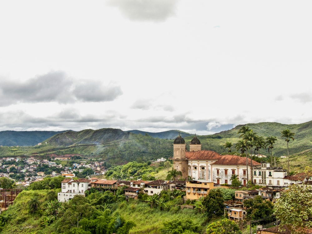 a view of a small town in the mountains