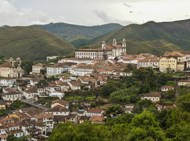 A panoramic view of a historic colonial town with cobblestone streets.