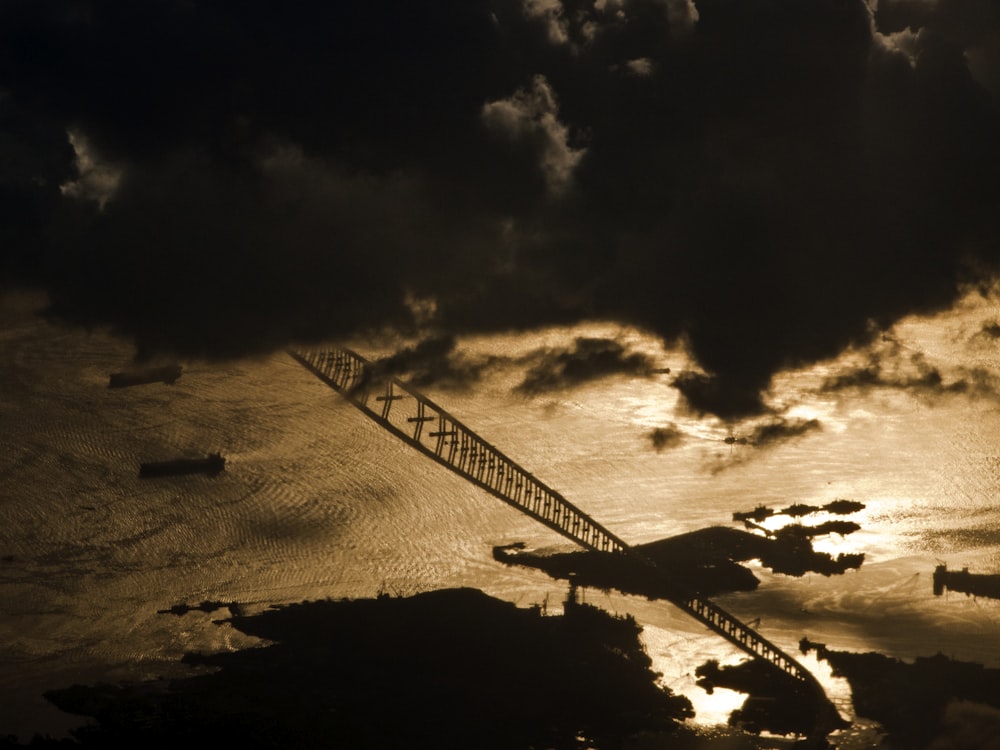 a large bridge spanning over a large body of water