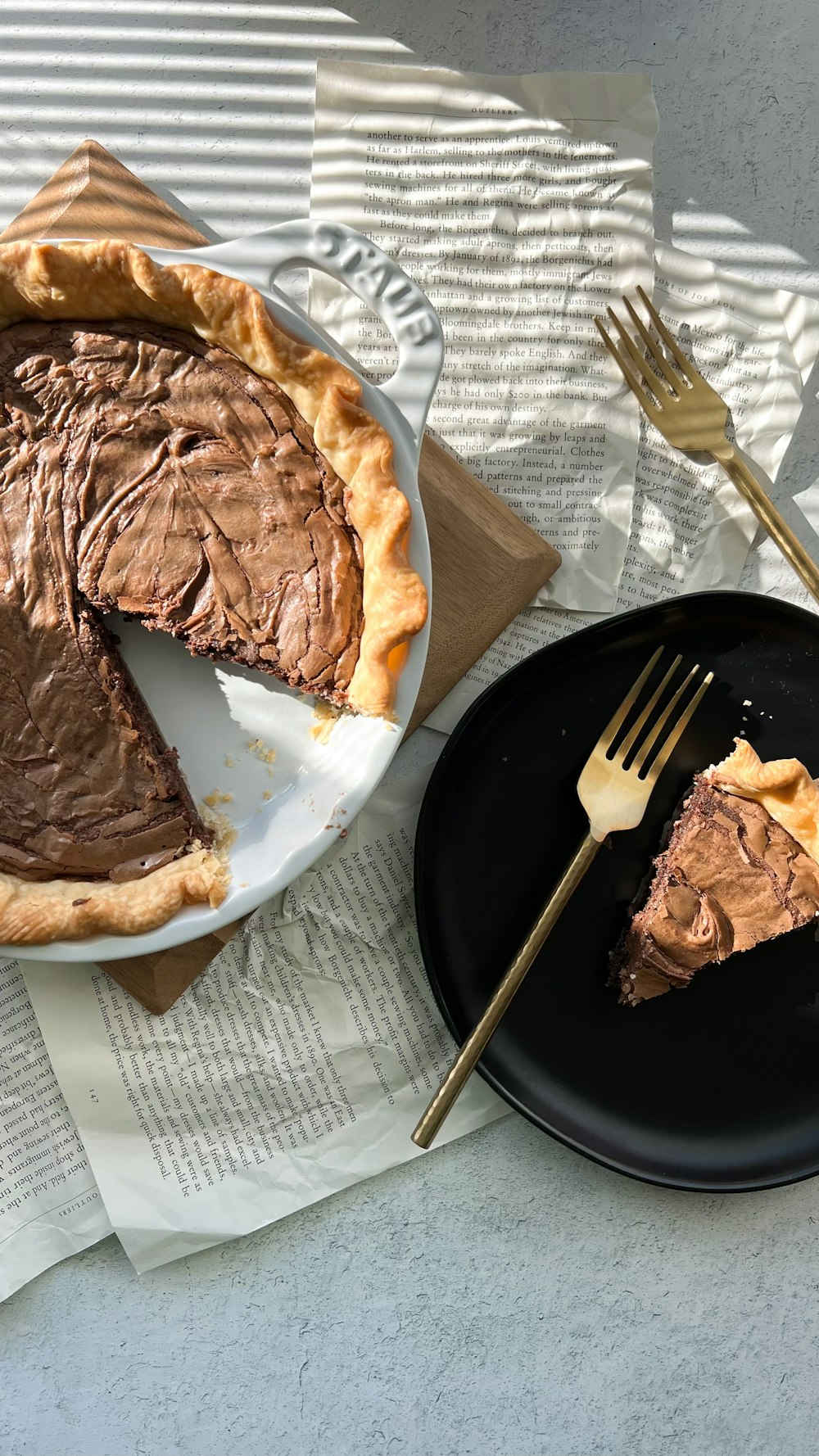 a slice of chocolate pie on a plate with a fork