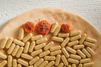 a plate full of pills and some meatballs