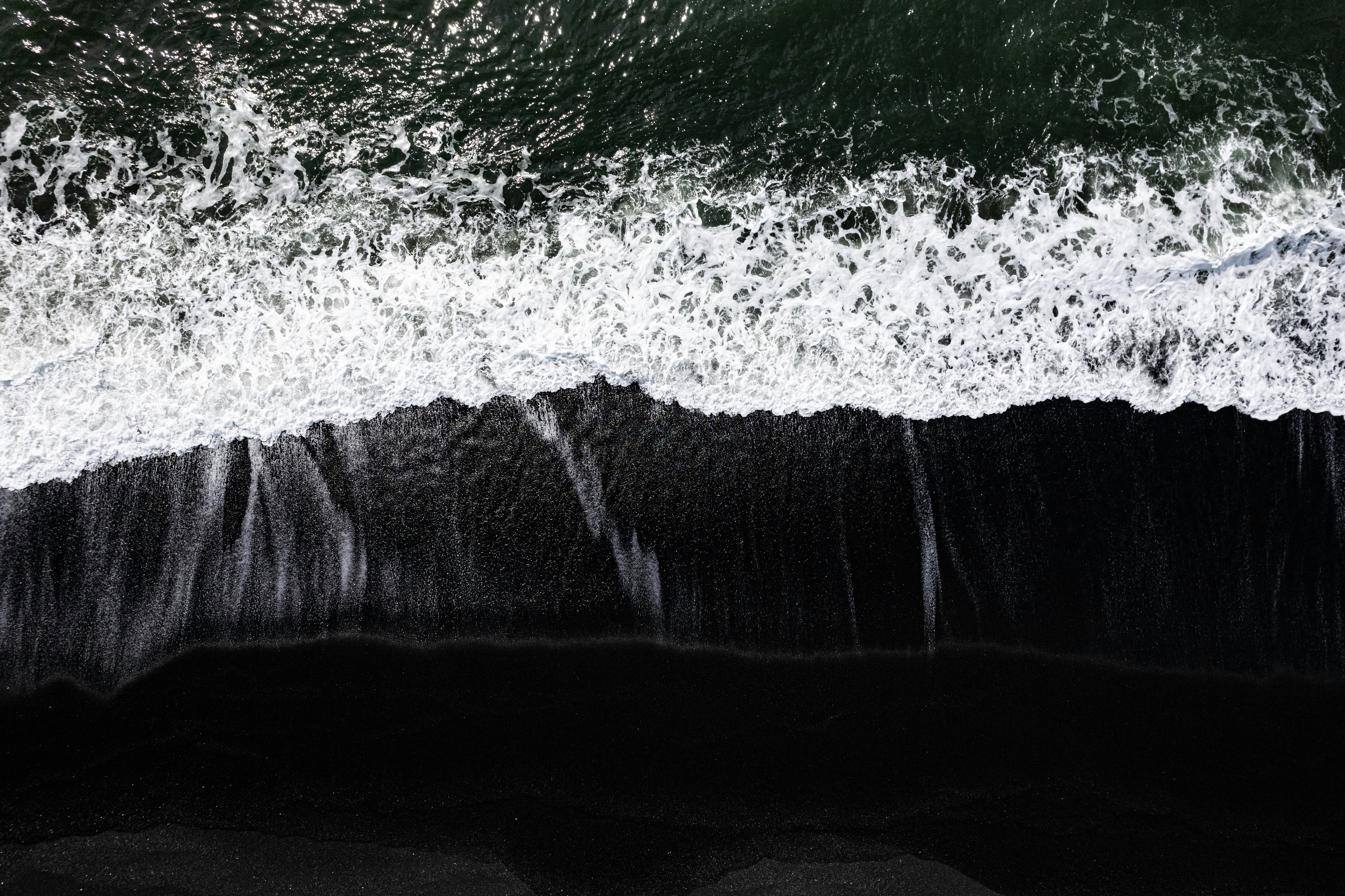a black and white photo of the ocean