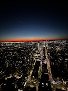 Night view of a city skyline powered by renewable energy.