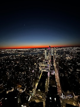 Night view of a city skyline powered by renewable energy.